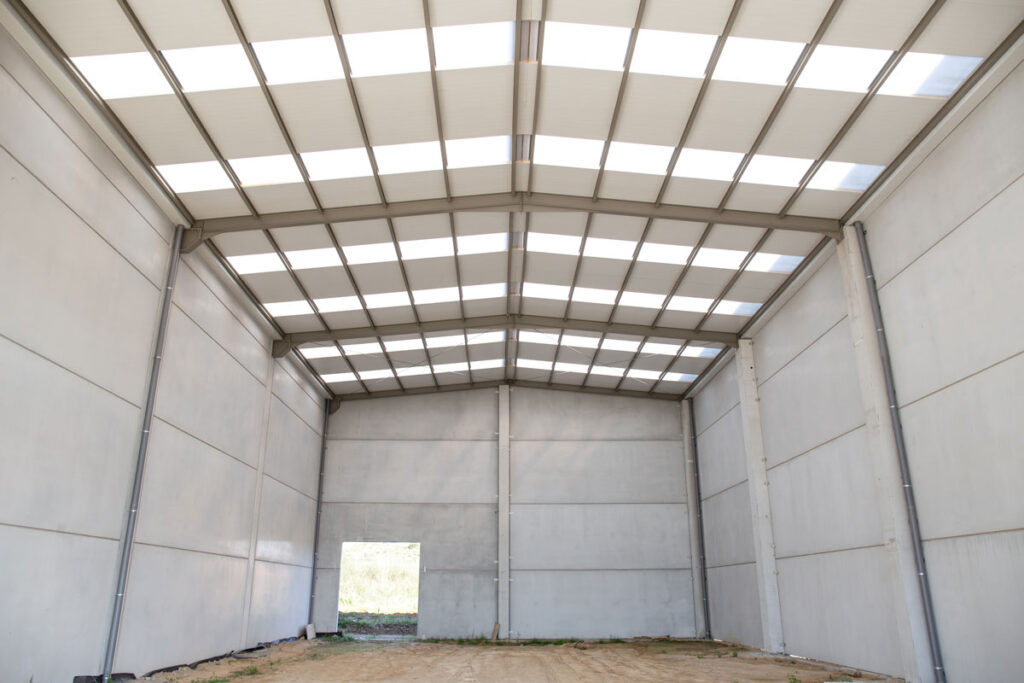 Framed workshop being built alongside a new home